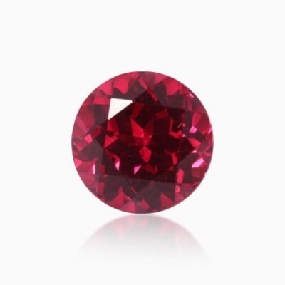 round cut lab grown dark pink sapphire